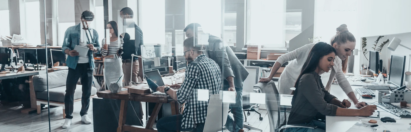 Professionals collaborating in a bright office environment.